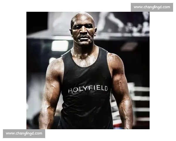 力量与意志的交锋霍利菲尔德对决福尔曼的世纪拳台巅峰之战